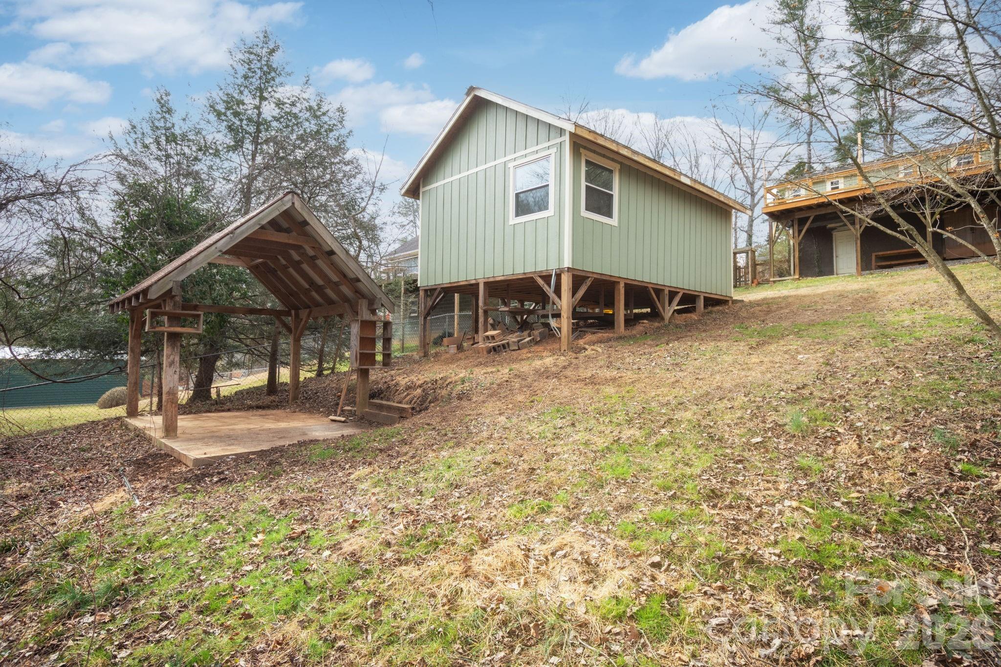 127 Shelburne Road Asheville, NC 28806 - Photo 25 of 28 a view of a house with a yard