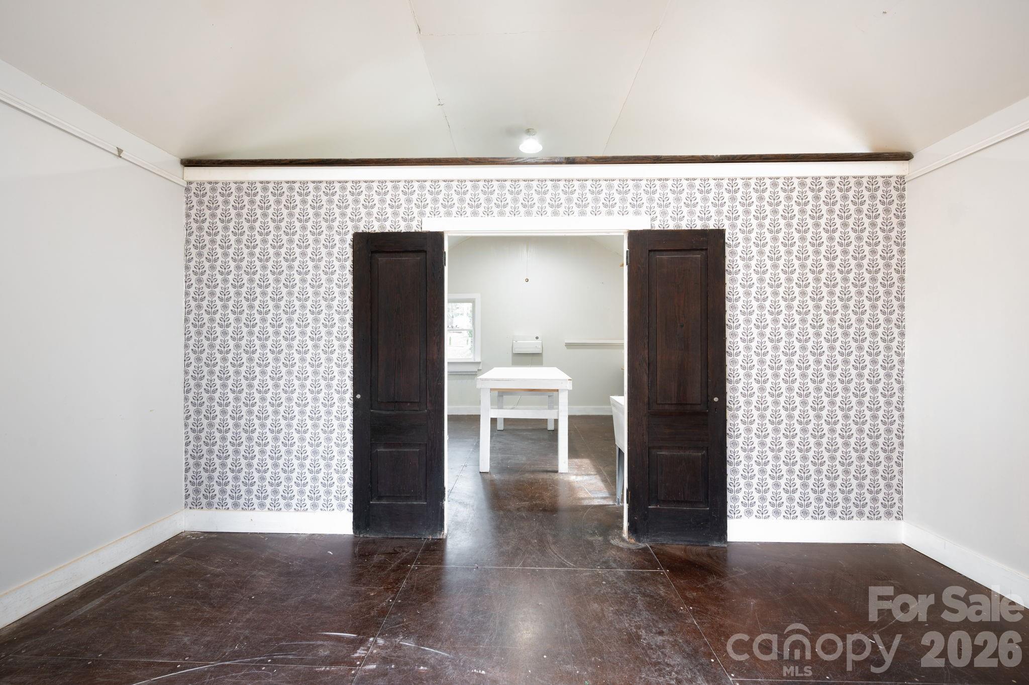 127 Shelburne Road Asheville, NC 28806 - Photo 27 of 28 a view of a hallway with wooden floor