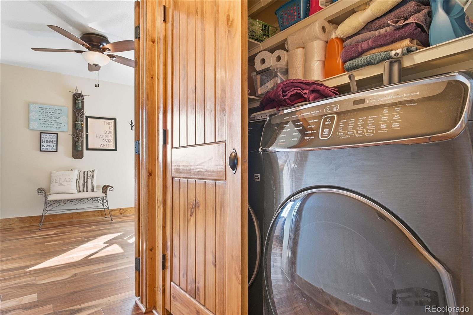 8790 South Warhawk Road Conifer, CO 80433 - Photo 22 of 41 a close view of a sink and a mirror on a wall