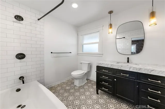 a bathroom with a white bath tub