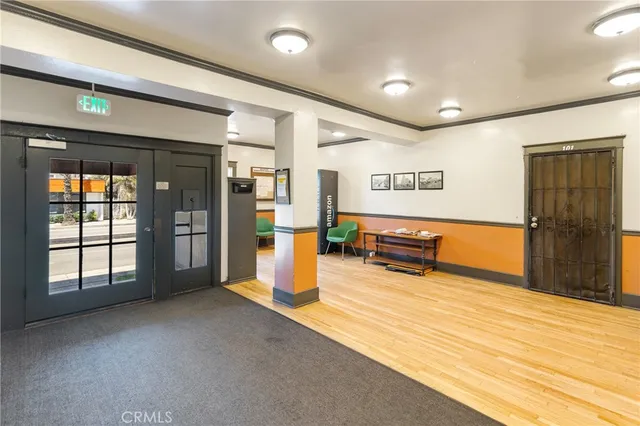 a front view of a building with pots