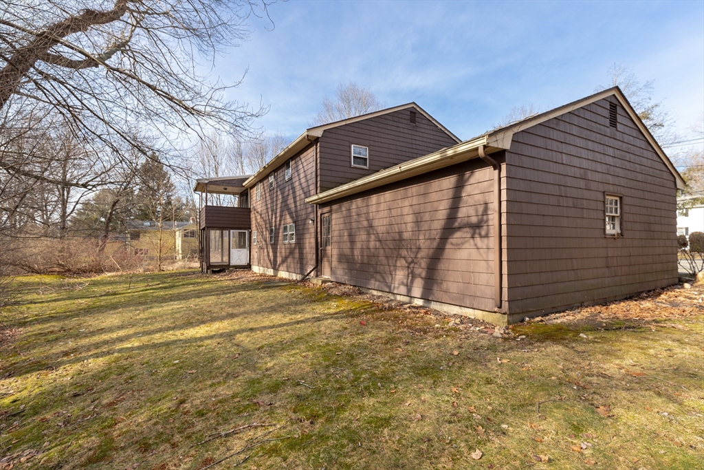 51 Eldred Street Lexington, MA 02420 - Photo 26 of 30 a view of a house with a yard