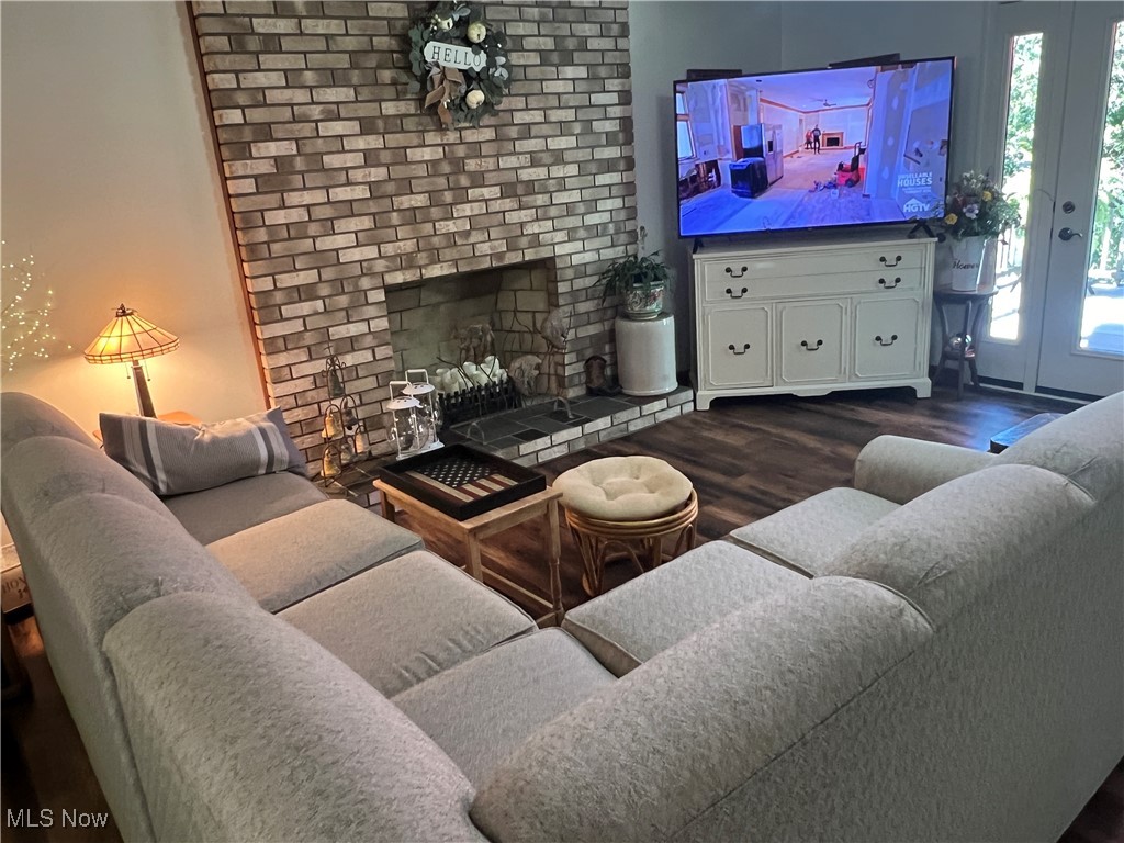 86422 North Bay Road Scio, OH 43988 - Photo 10 of 47 Living room featuring wood-type flooring and a brick fireplace