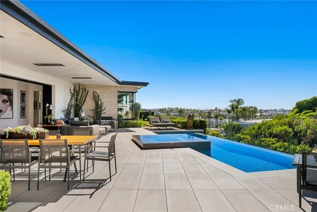 a view of swimming pool from a balcony