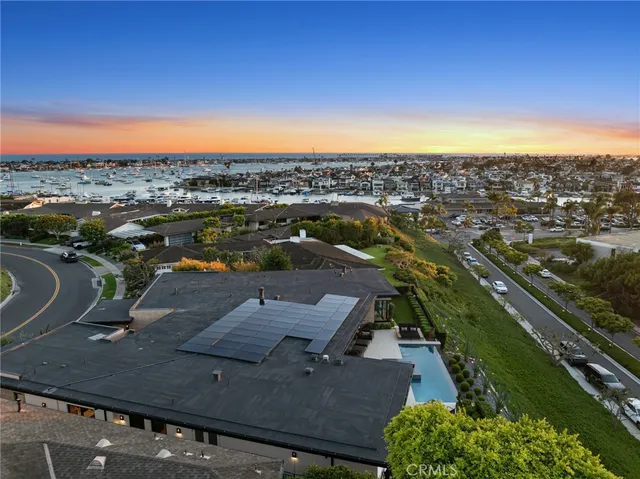 a front view of a house with a ocean view