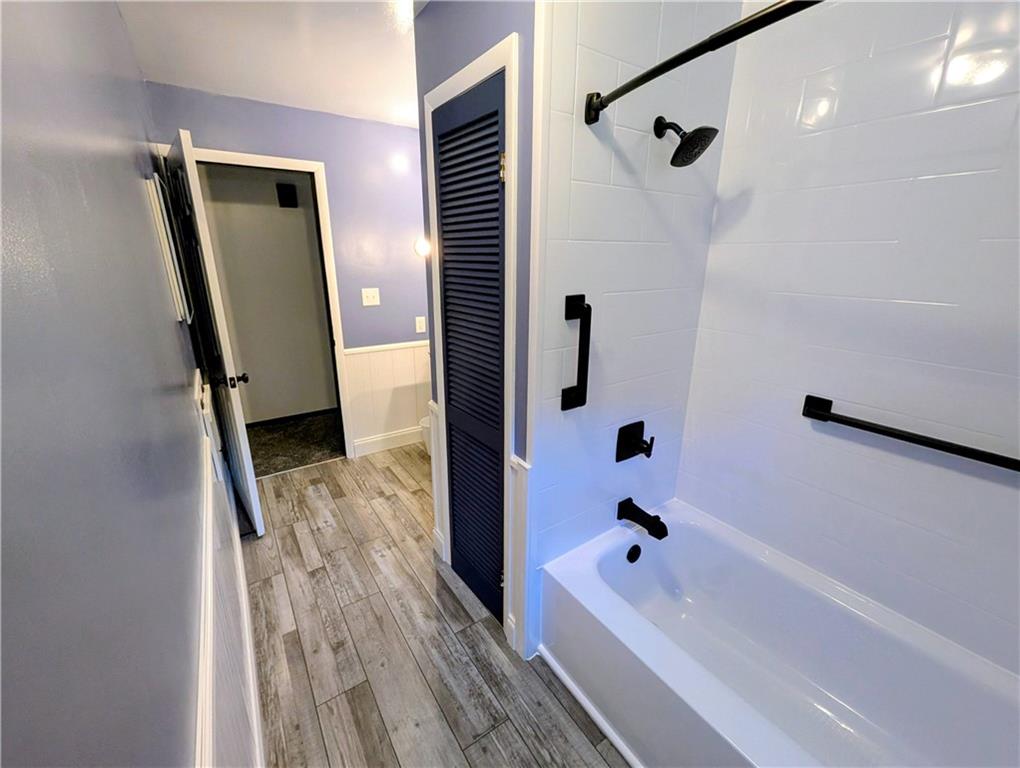 165 Saxonburg Road Butler, PA 16002 - Photo 18 of 44 a bathroom with a tub a sink and a shower