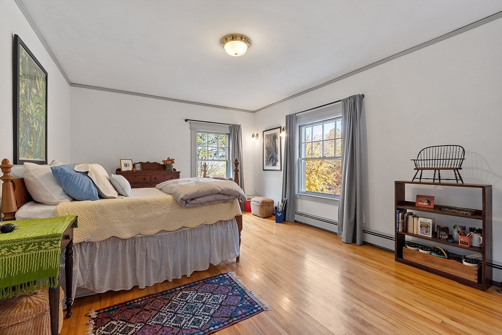 4 Bolton Road Harvard, MA 01451 - Photo 28 of 42 a bedroom with a bed and a window