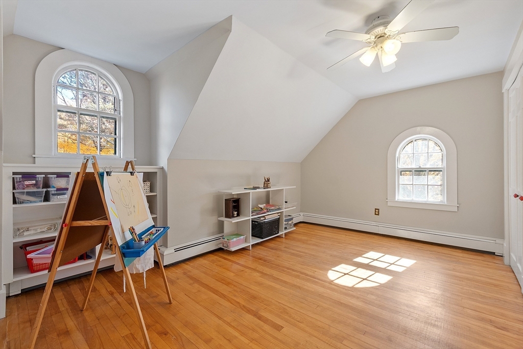 4 Bolton Road Harvard, MA 01451 - Photo 36 of 42 a view of a room with wooden floor staircase and windows