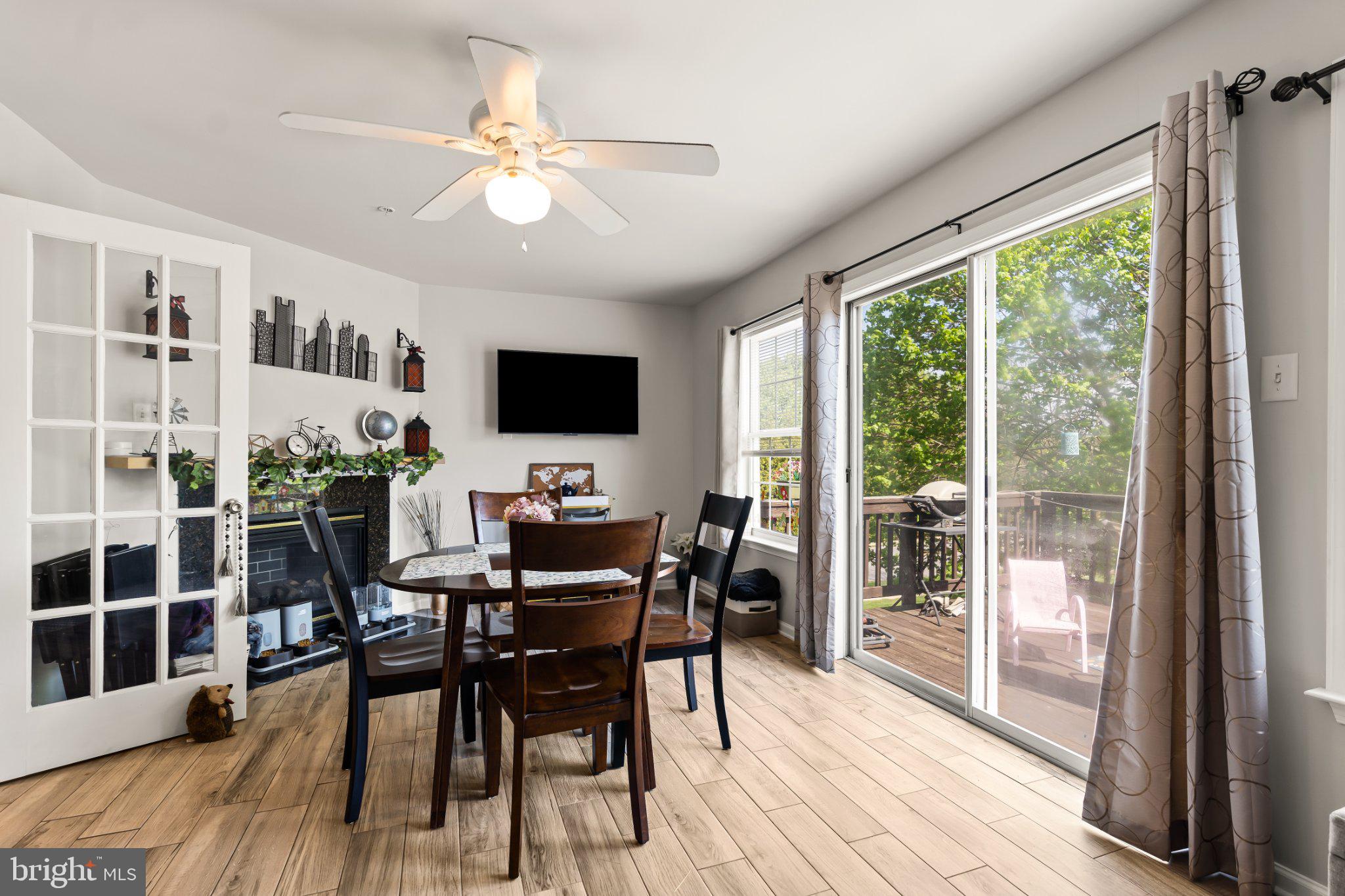 128 Sentry Ridge Smithsburg, MD 21783 - Photo 15 of 41 a view of a dining room with furniture window and wooden floor