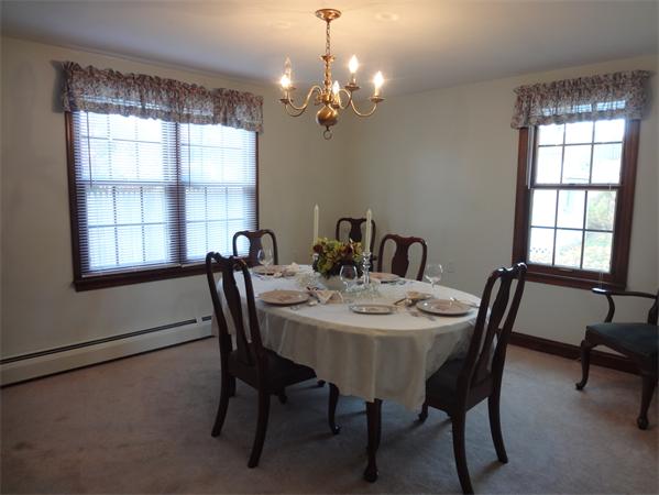 25 Bennett Road Marblehead, MA 01945 - Photo 6 of 15 a view of a dining room with furniture and window