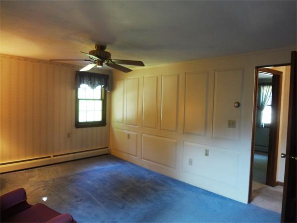 25 Bennett Road Marblehead, MA 01945 - Photo 9 of 15 wooden floor in an empty room with a window