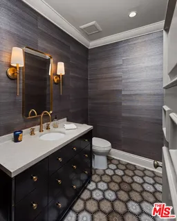 a bathroom with a sink and a toilet