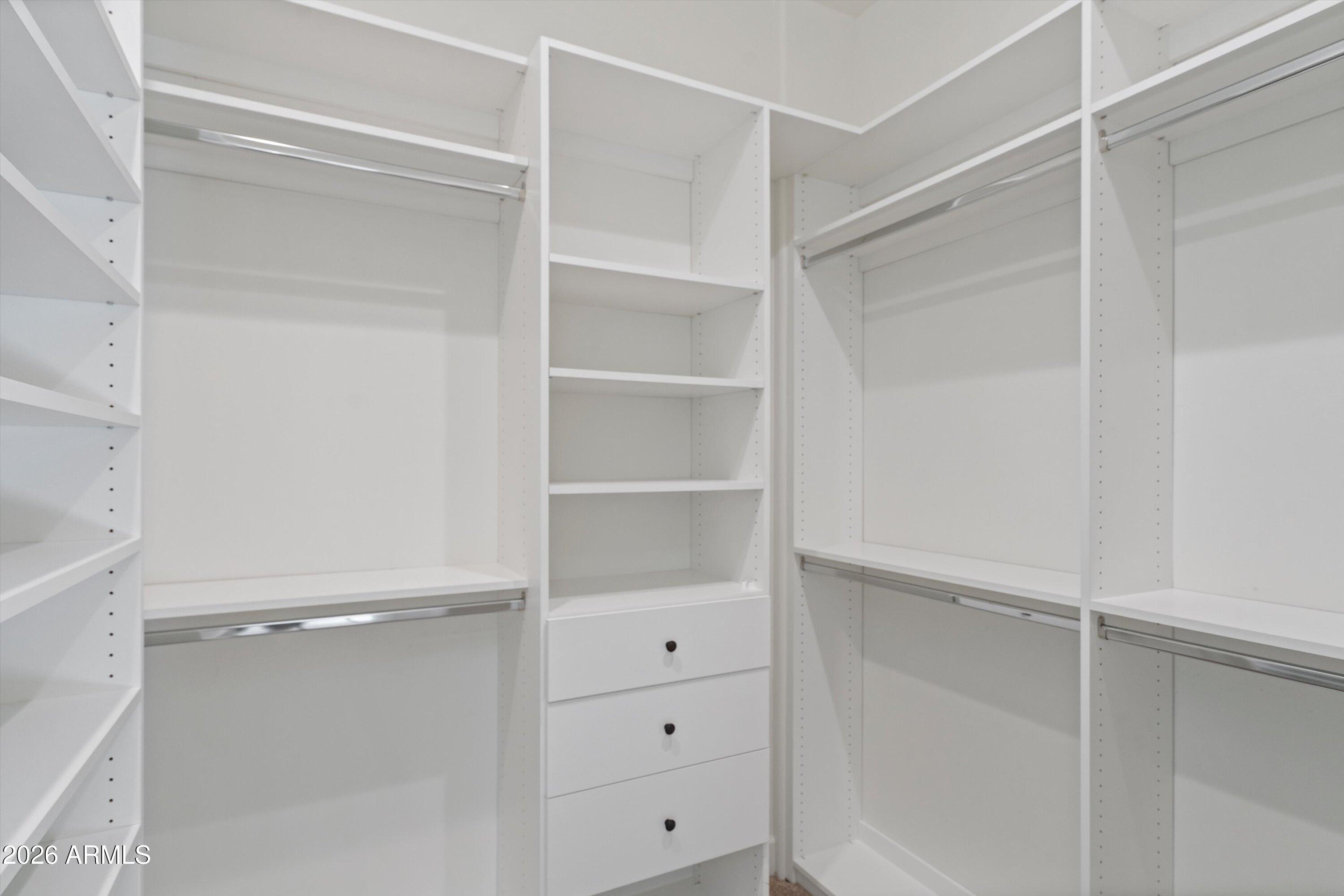 4602 East Mockingbird Lane Phoenix, AZ 85028 - Photo 25 of 41 a view of an empty walk in closet