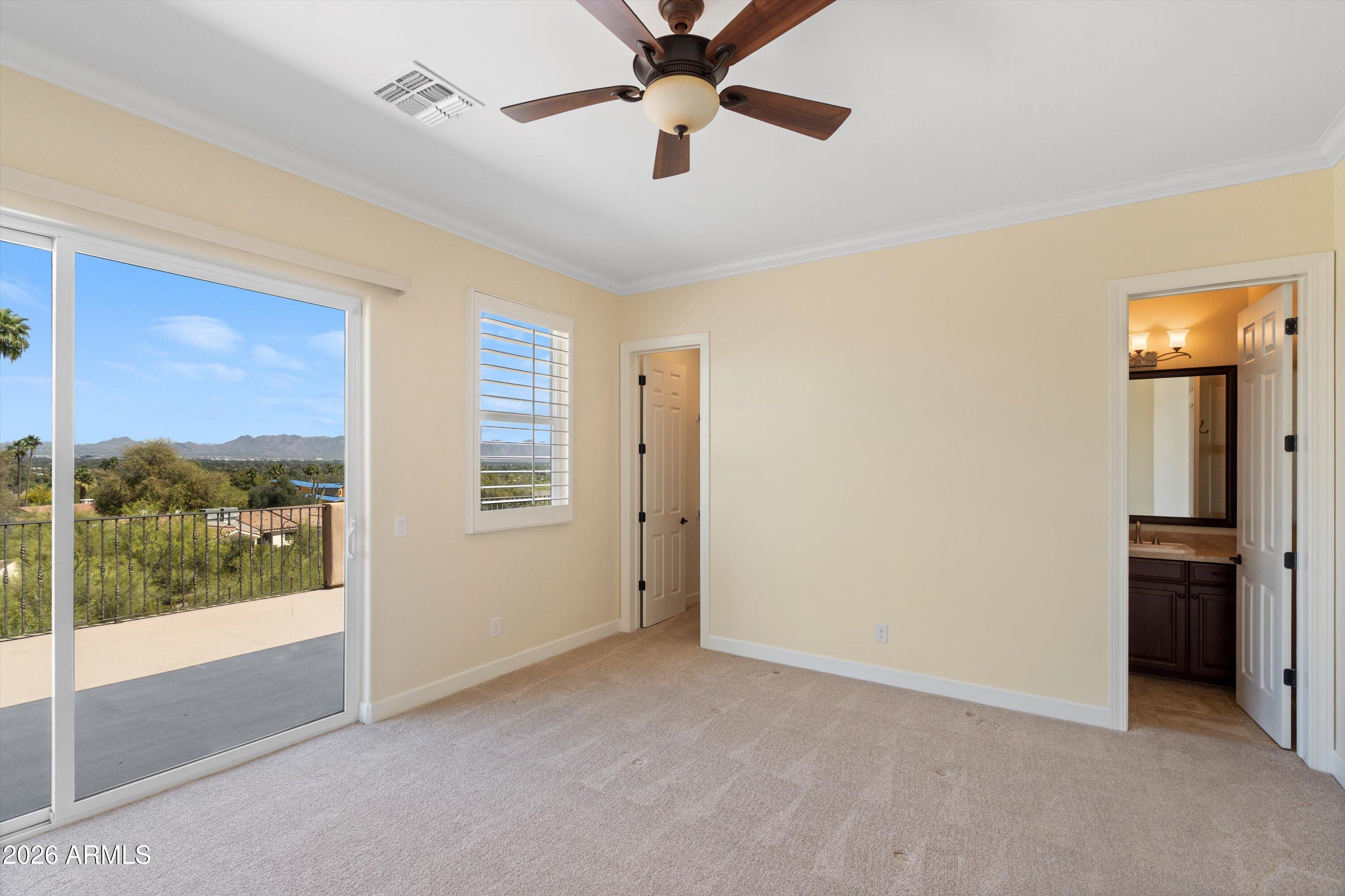 4602 East Mockingbird Lane Phoenix, AZ 85028 - Photo 32 of 41 a view of an empty room with a window