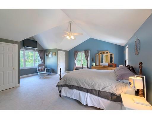 21 Indian Ridge Road Stow, MA 01775 - Photo 16 of 30 a bed room with a bed and a chair