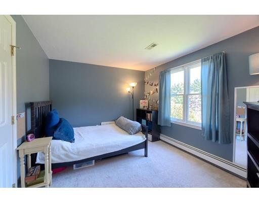 21 Indian Ridge Road Stow, MA 01775 - Photo 23 of 30 a bedroom with a bed and window