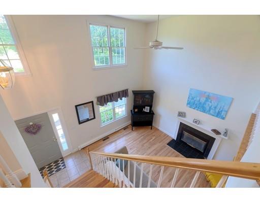 21 Indian Ridge Road Stow, MA 01775 - Photo 24 of 30 a living room with furniture and a flat screen tv