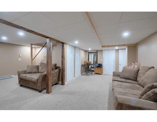 21 Indian Ridge Road Stow, MA 01775 - Photo 25 of 30 a living room with furniture and a couch