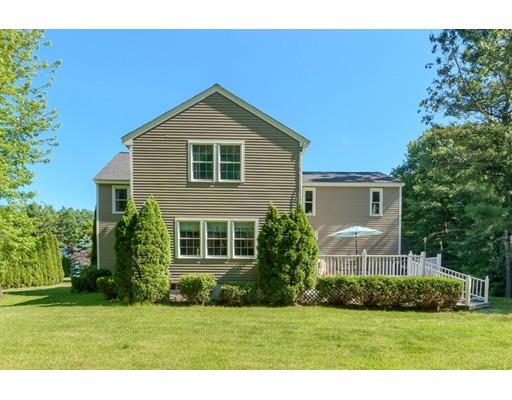 21 Indian Ridge Road Stow, MA 01775 - Photo 27 of 30 a front view of a house with a yard