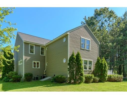21 Indian Ridge Road Stow, MA 01775 - Photo 28 of 30 a view of a house with a yard