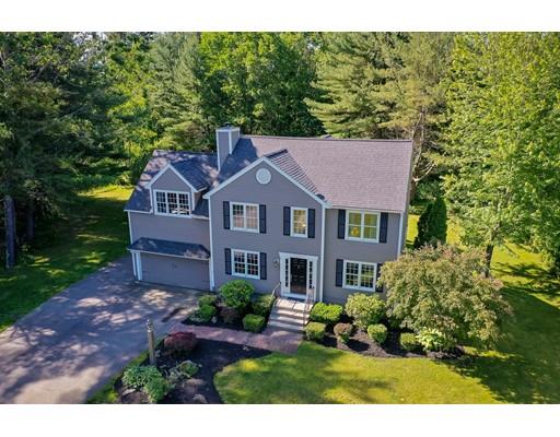 21 Indian Ridge Road Stow, MA 01775 - Photo 30 of 30 a aerial view of a house with a yard and potted plants