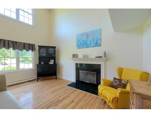 21 Indian Ridge Road Stow, MA 01775 - Photo 4 of 30 a living room with furniture and a fireplace