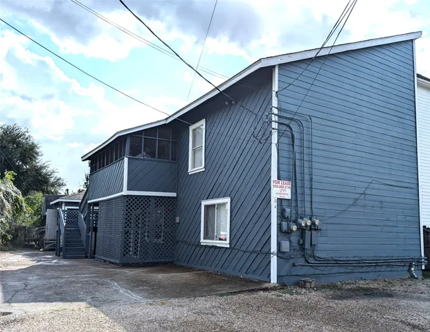 a brick house with a large windows
