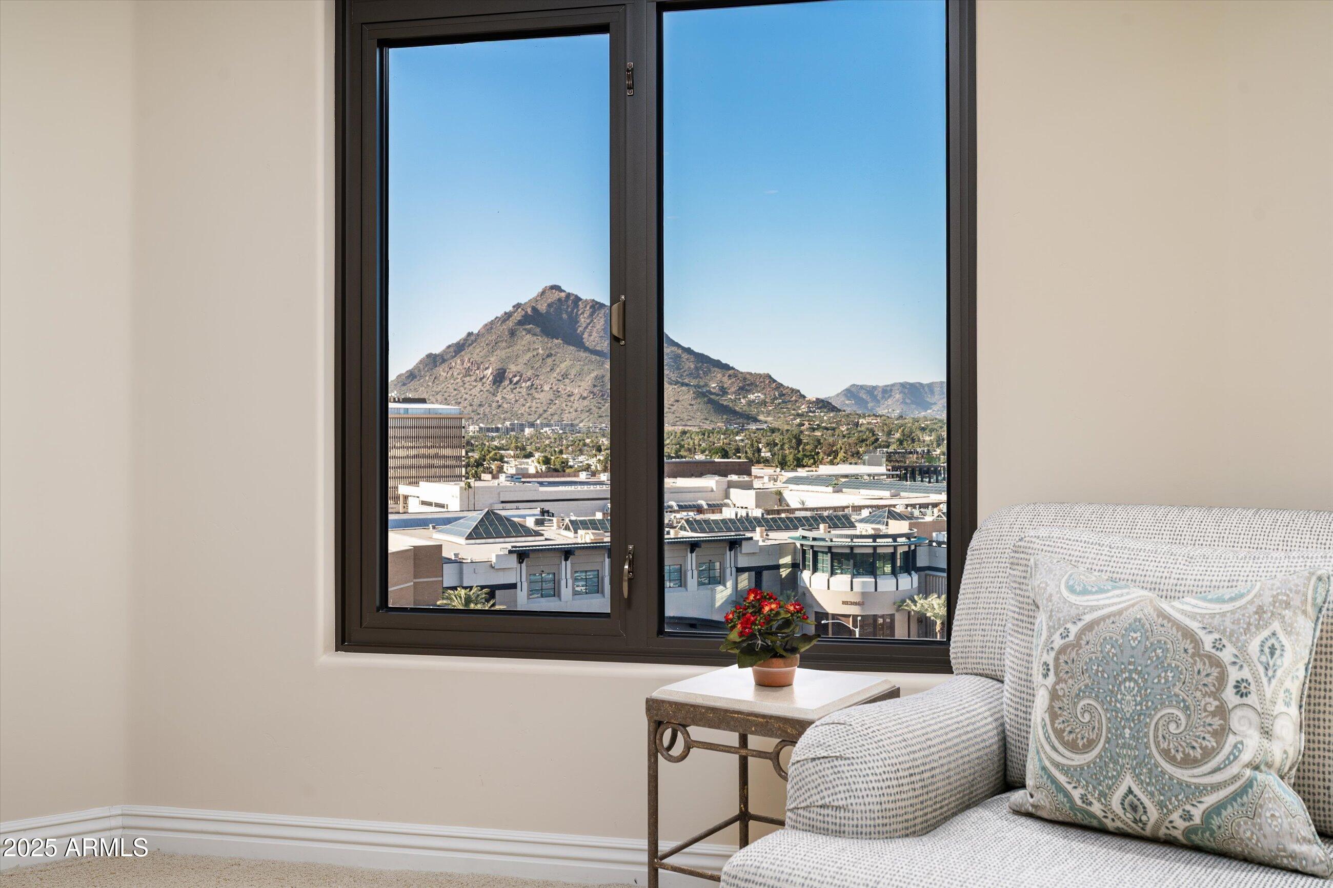 7181 East Camelback Road, Unit 1202 Scottsdale, AZ 85251 - Photo 24 of 47 a living room with furniture