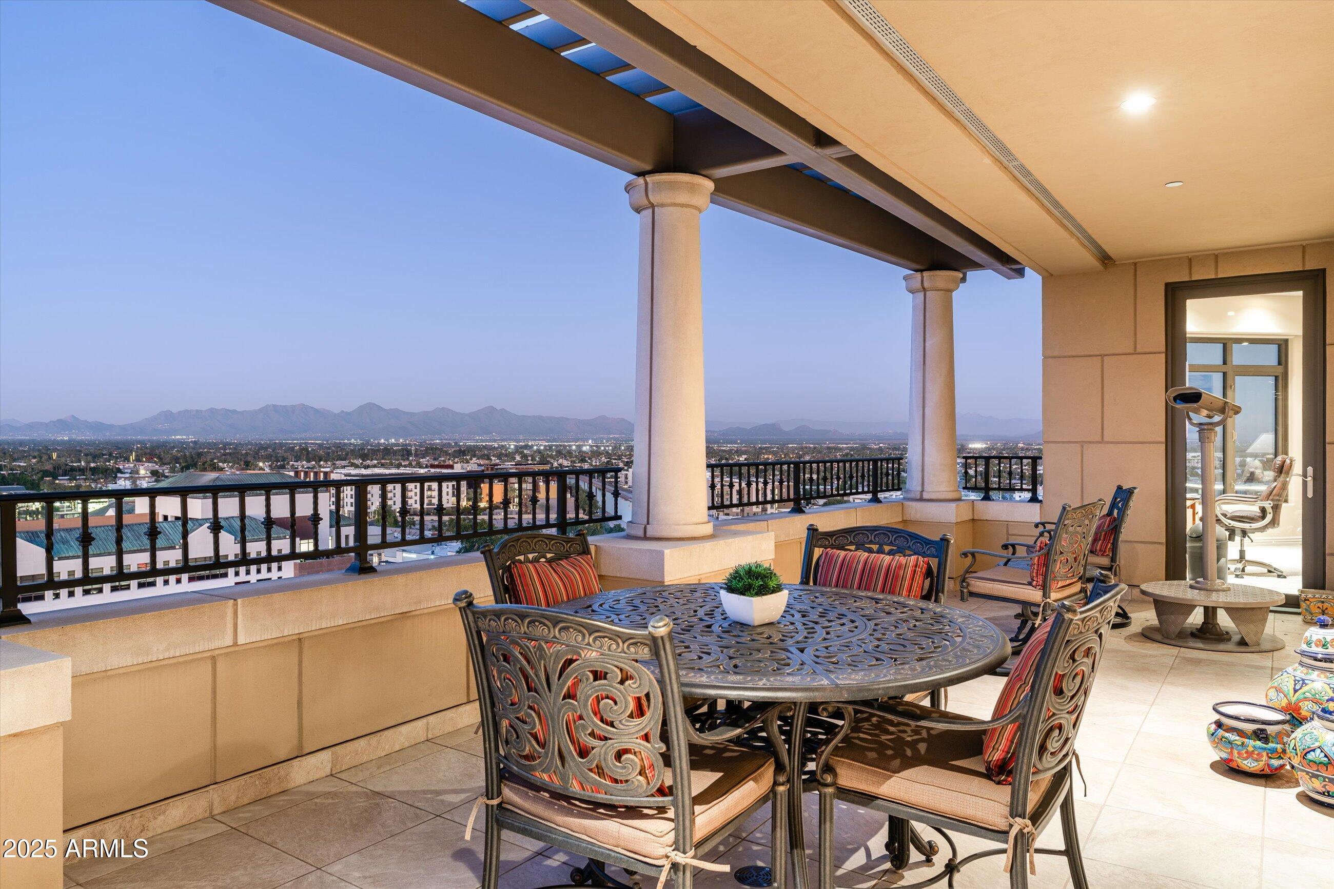 7181 East Camelback Road, Unit 1202 Scottsdale, AZ 85251 - Photo 38 of 47 a outdoor view with a sitting space