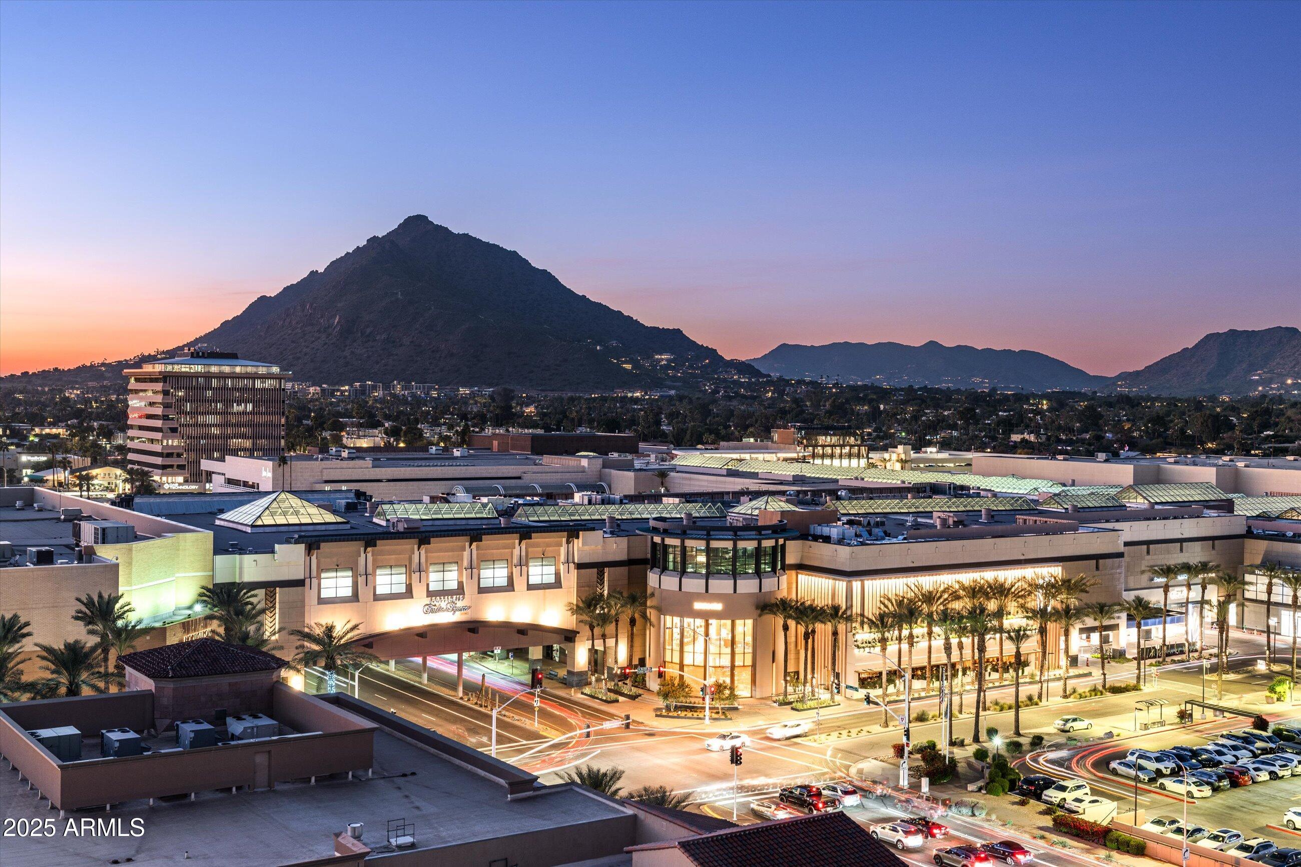 7181 East Camelback Road, Unit 1202 Scottsdale, AZ 85251 - Photo 42 of 47 a view of a lake with a mountain