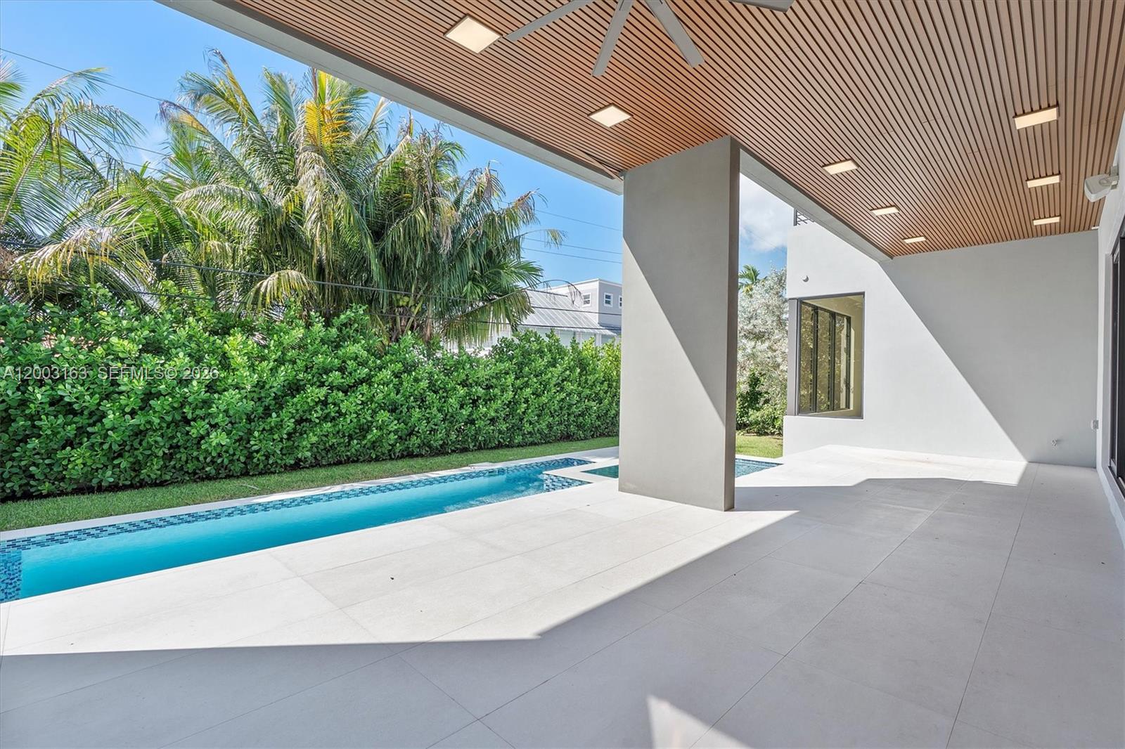 760 Woodcrest Road Key Biscayne, FL 33149 - Photo 39 of 43 a view of a garden with an outdoor space