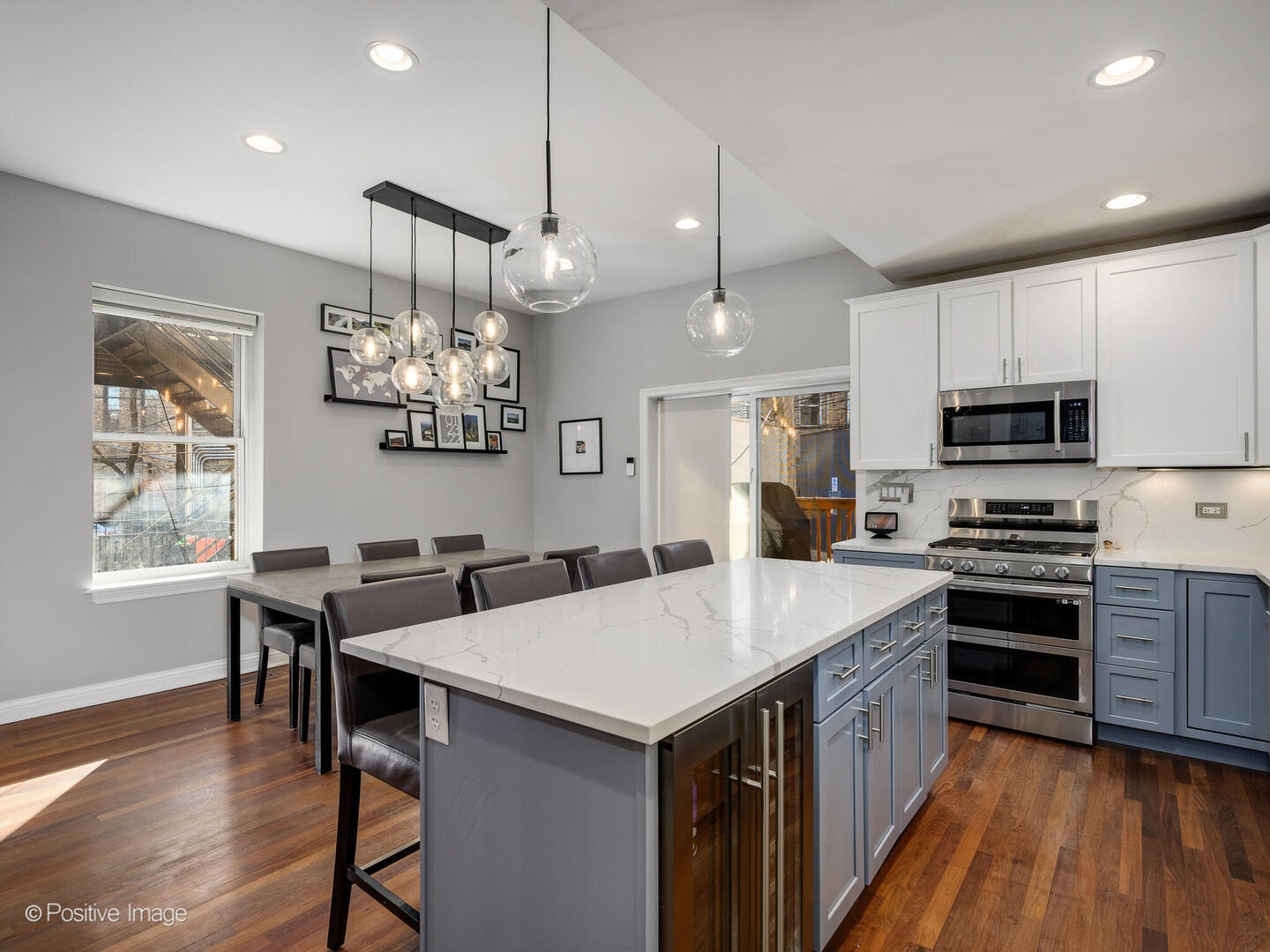 1440 North Wood Street, Unit 1R Chicago, IL 60622 - Photo 11 of 22 a kitchen with a center island appliances and cabinets