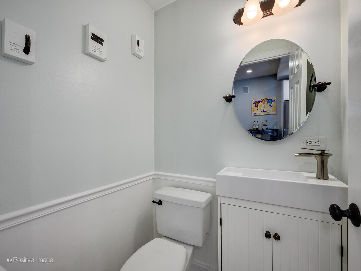 1440 North Wood Street, Unit 1R Chicago, IL 60622 - Photo 12 of 22 a bathroom with a toilet and a sink