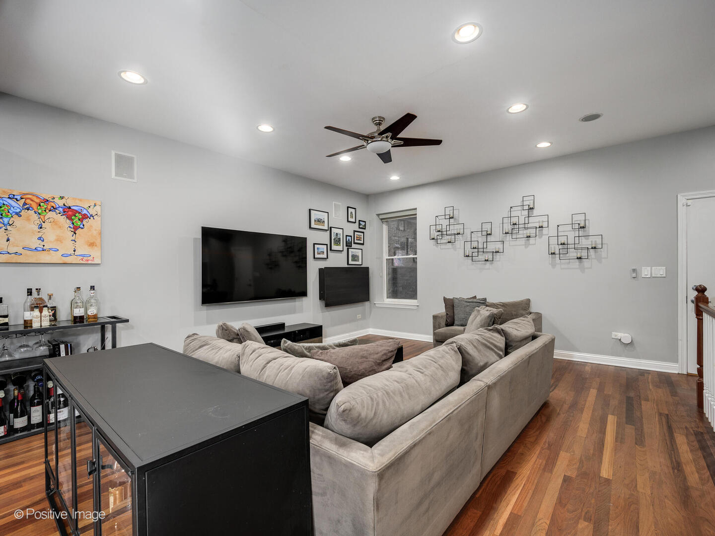 1440 North Wood Street, Unit 1R Chicago, IL 60622 - Photo 5 of 22 a living room with furniture and a flat screen tv