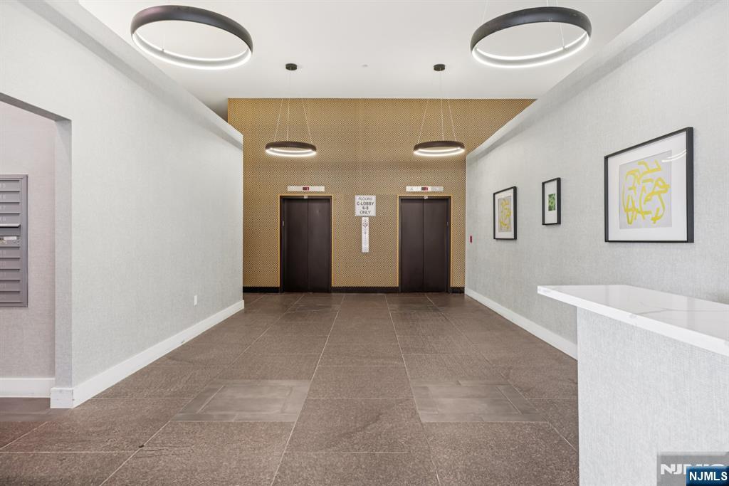 2 Executive Drive, Unit 809 Fort Lee, NJ 07024 - Photo 5 of 11 a view of an empty room with a window