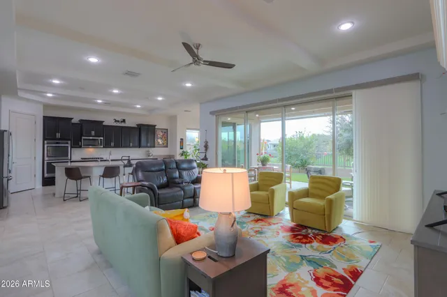 a view of walk in closet with clothes