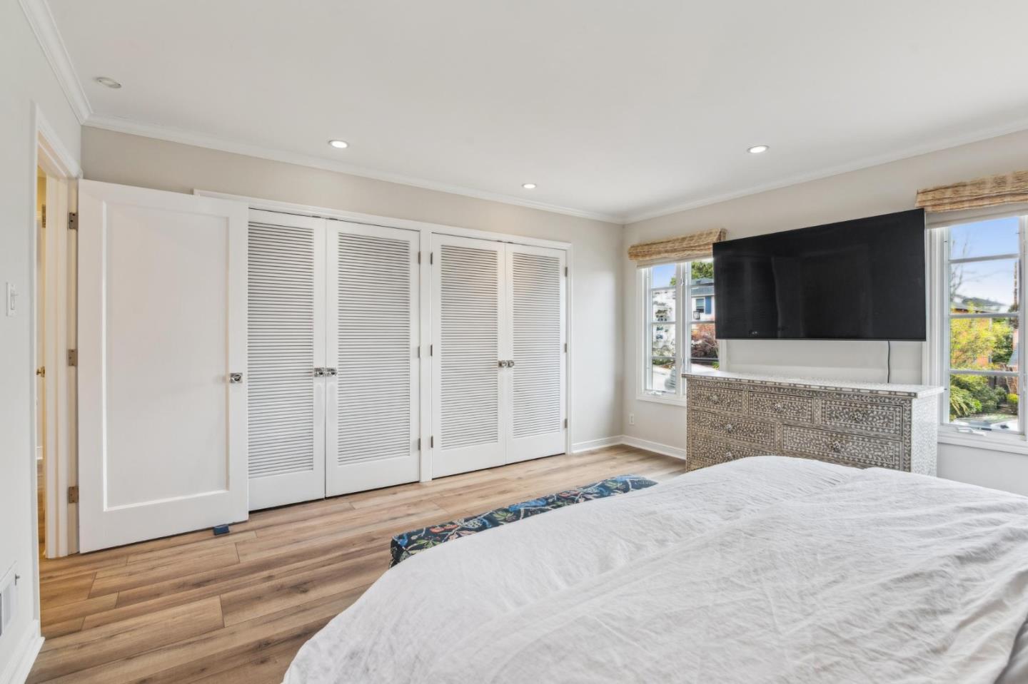 731 Oregon Avenue San Mateo, CA 94402 - Photo 13 of 34 a bedroom with a bed and a flat screen tv