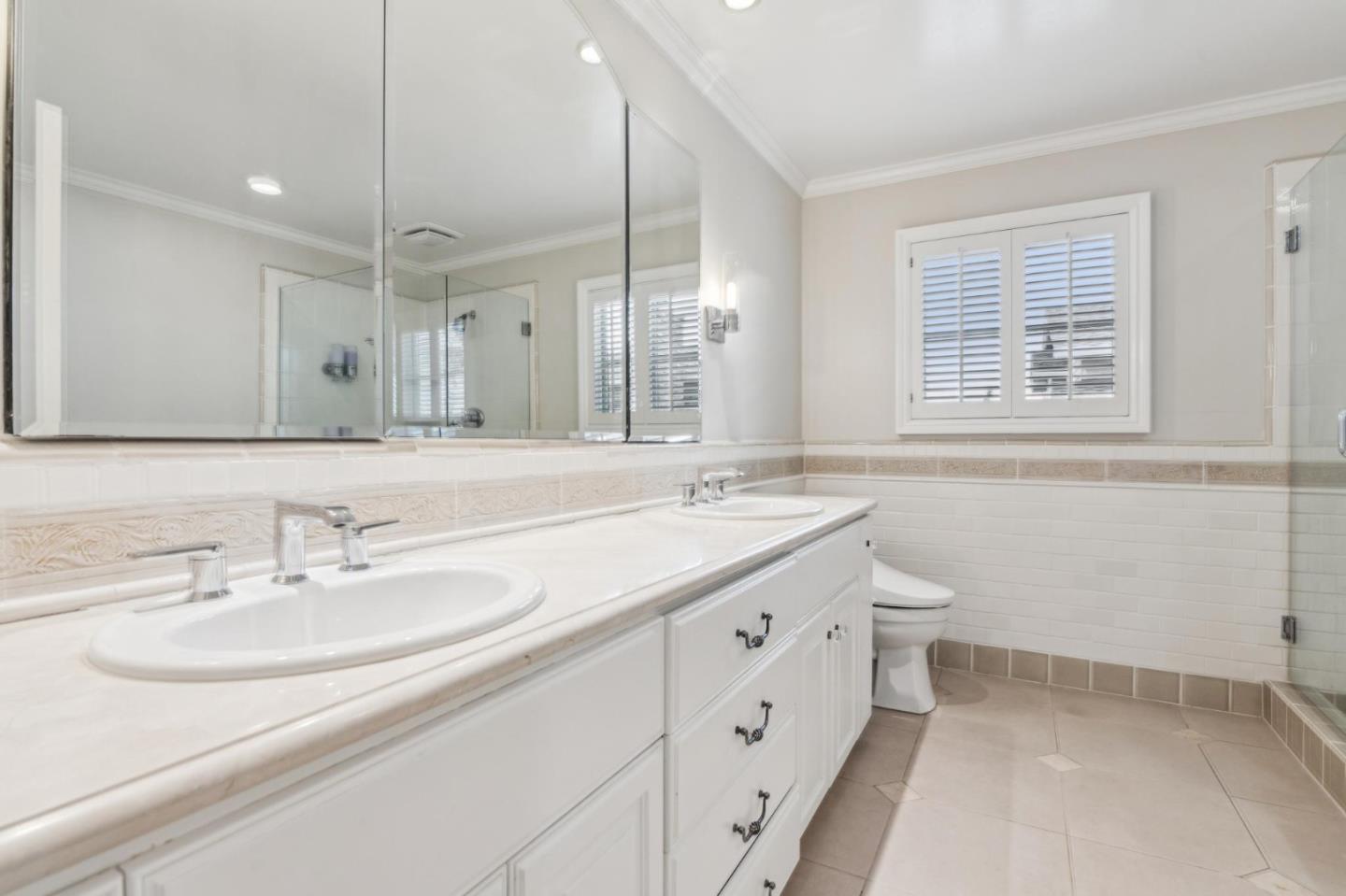 731 Oregon Avenue San Mateo, CA 94402 - Photo 15 of 34 a bathroom with a sink double vanity and a mirror