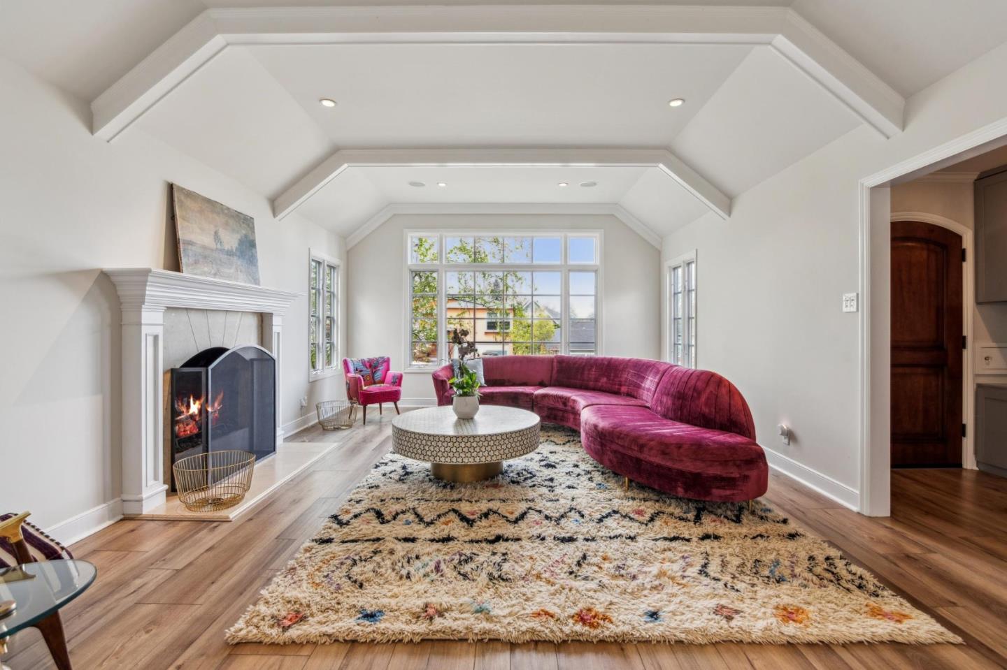 731 Oregon Avenue San Mateo, CA 94402 - Photo 2 of 34 a living room with furniture a rug and a fireplace
