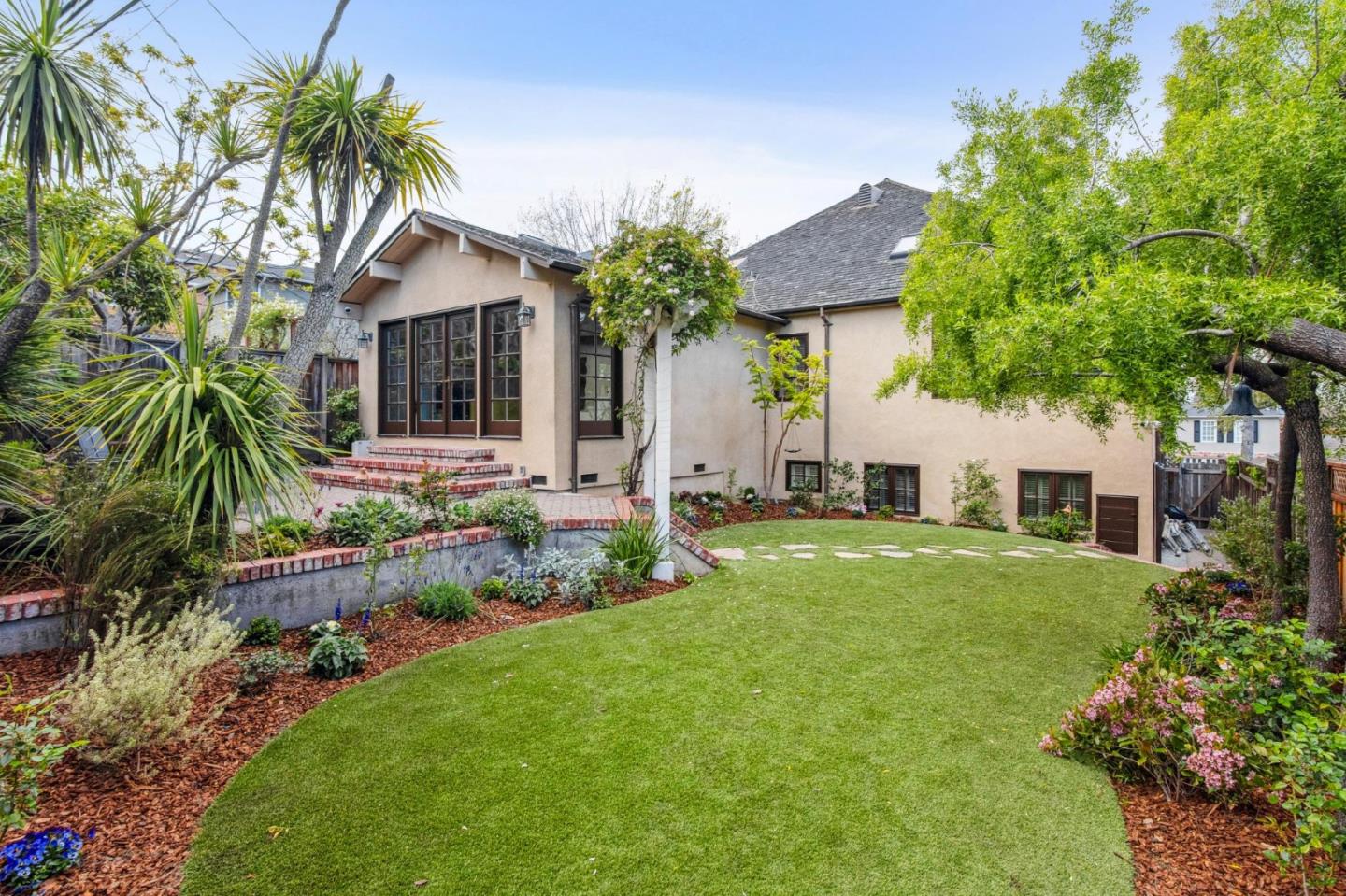 731 Oregon Avenue San Mateo, CA 94402 - Photo 32 of 34 a front view of house with yard and trees