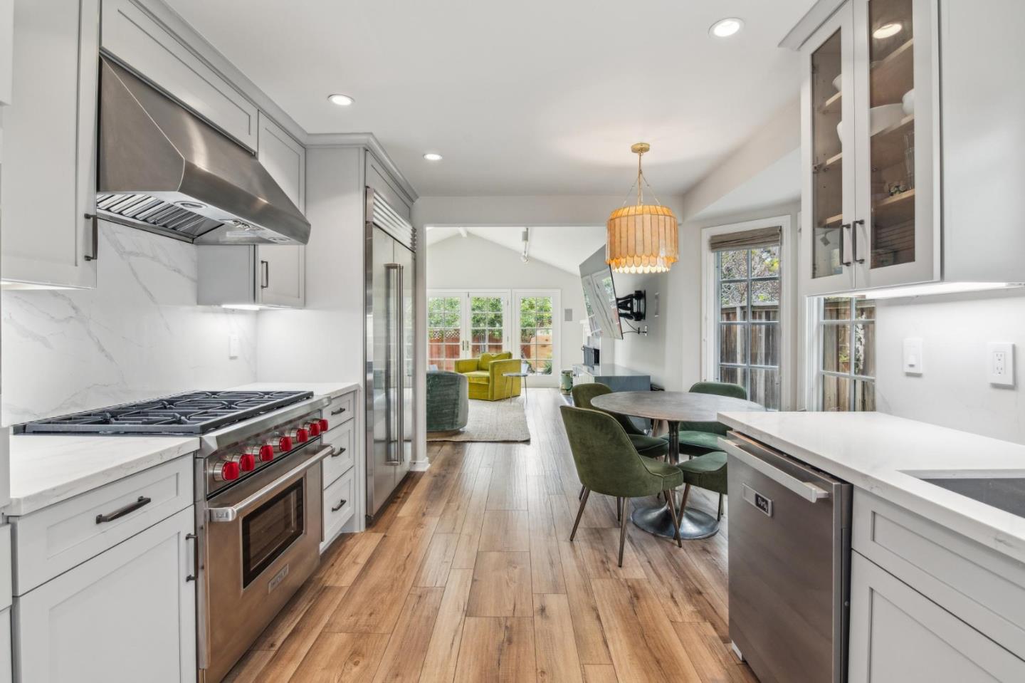 731 Oregon Avenue San Mateo, CA 94402 - Photo 8 of 34 a kitchen with stove and wooden floor