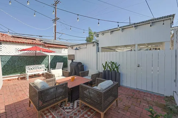 a outdoor space with patio lots of furniture