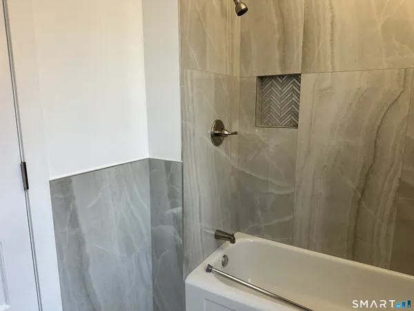 a bathroom with a bathtub