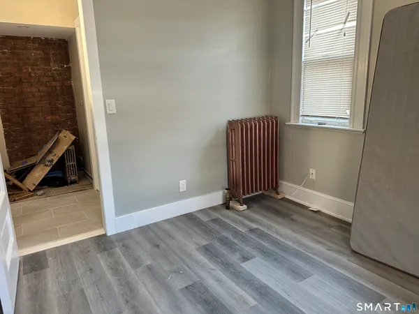 a view of an empty room and window