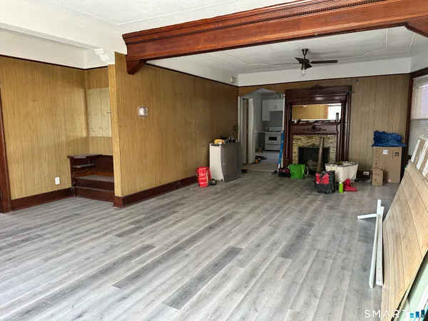 a view of a room with gym equipment and a window