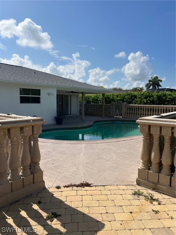 72 Pebble Beach Boulevard Naples, FL 34113 - Photo 3 of 15 a view of a terrace with a bench