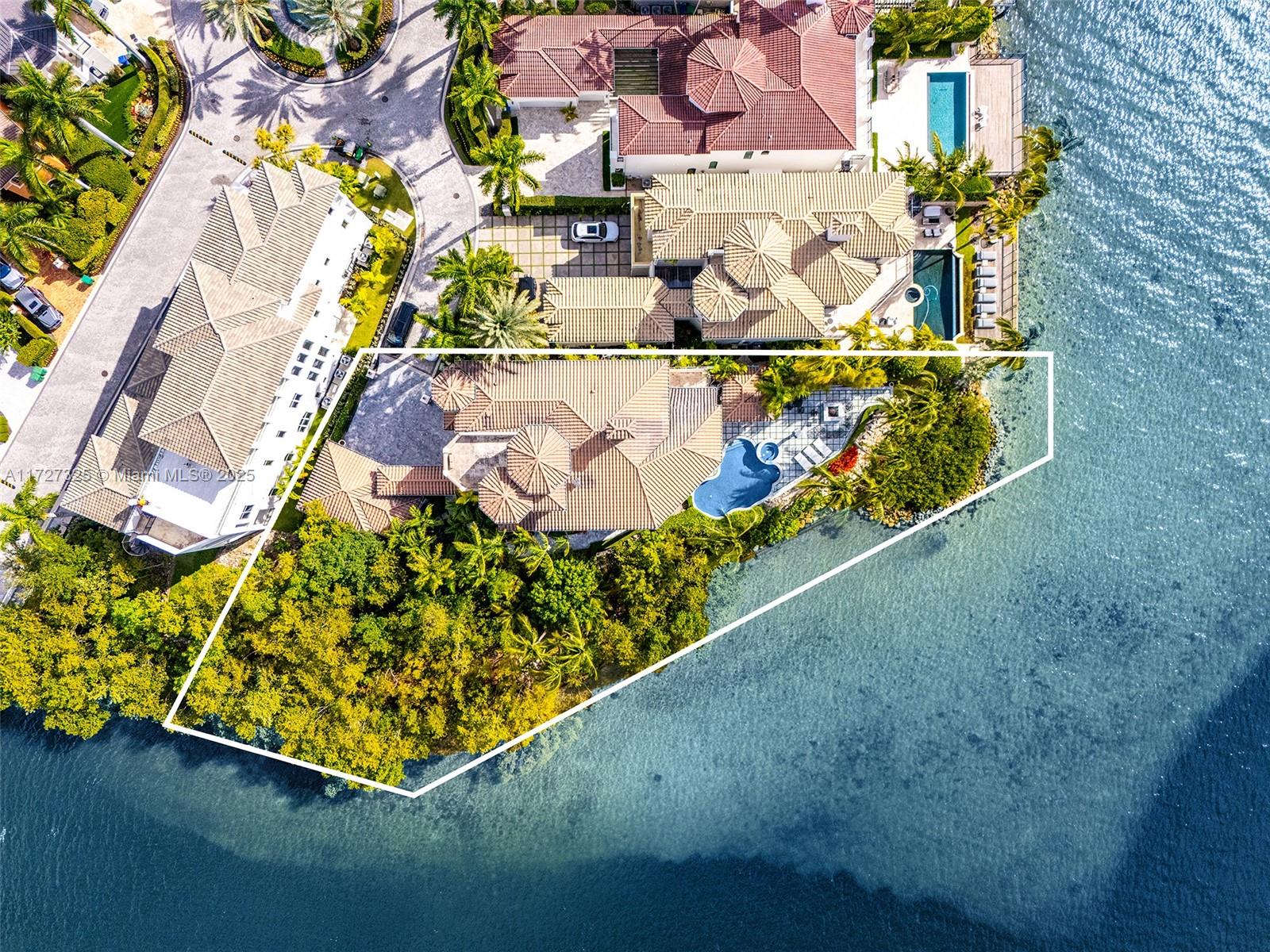 3914 Island Estates Drive Aventura, FL 33160 - Photo 1 of 40 a view of a back yard of the house