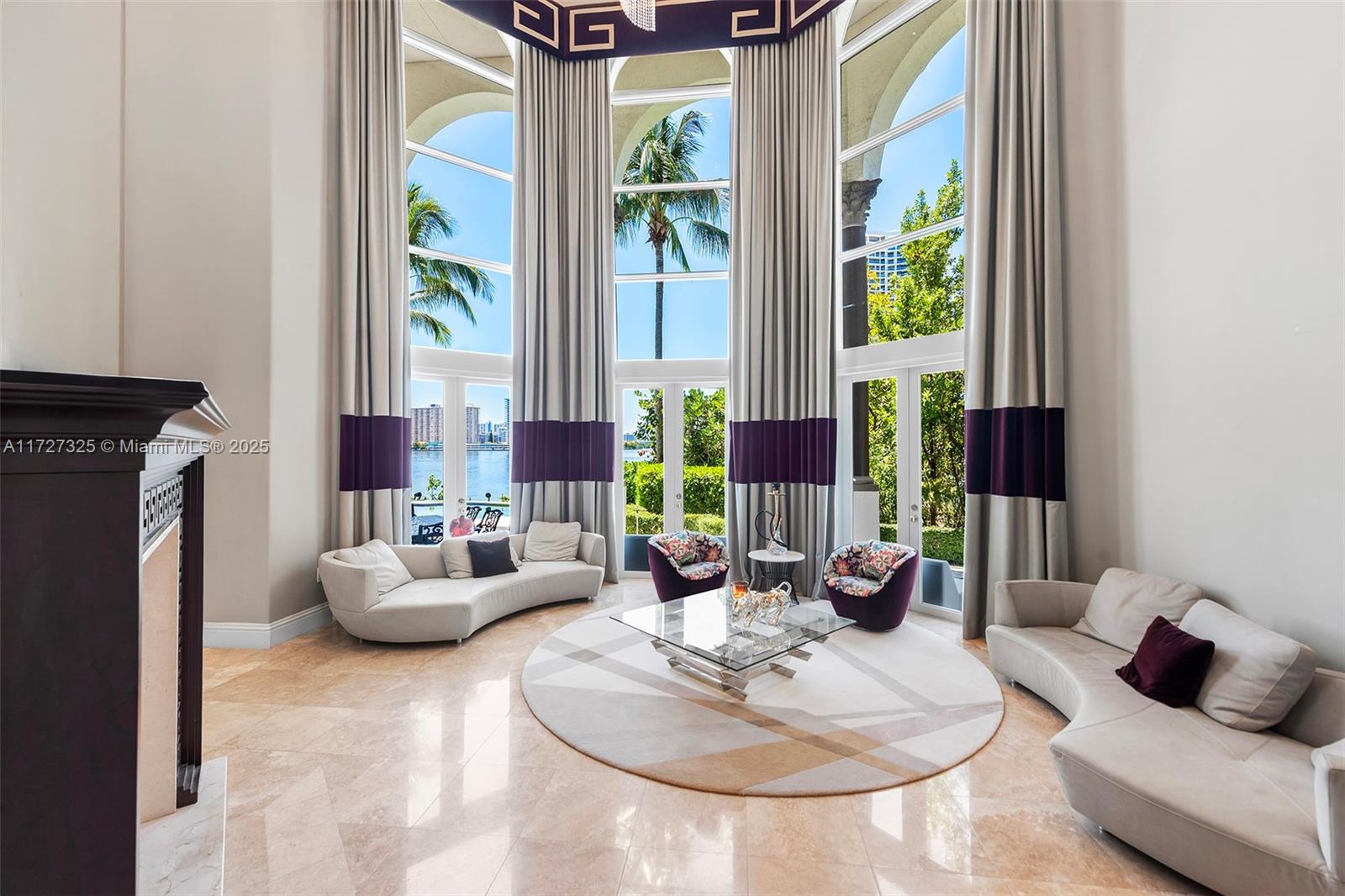 3914 Island Estates Drive Aventura, FL 33160 - Photo 11 of 40 a living room with furniture and a window