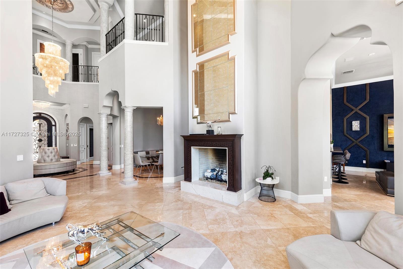 3914 Island Estates Drive Aventura, FL 33160 - Photo 13 of 40 a living room with furniture and a fireplace