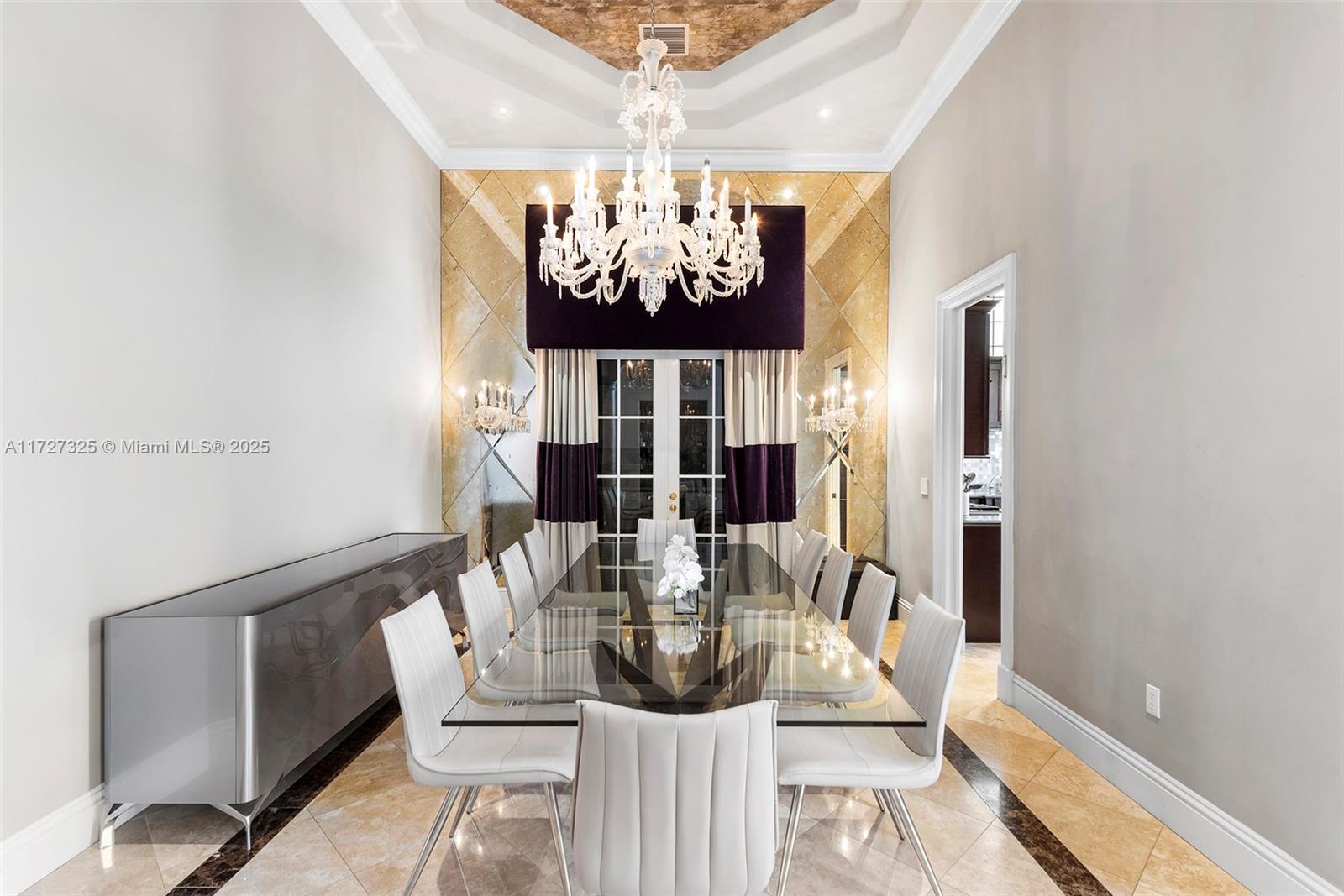 3914 Island Estates Drive Aventura, FL 33160 - Photo 14 of 40 a view of a dining room with furniture a chandelier and wooden floor